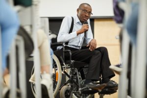 Man in Wheelchair with Microphone